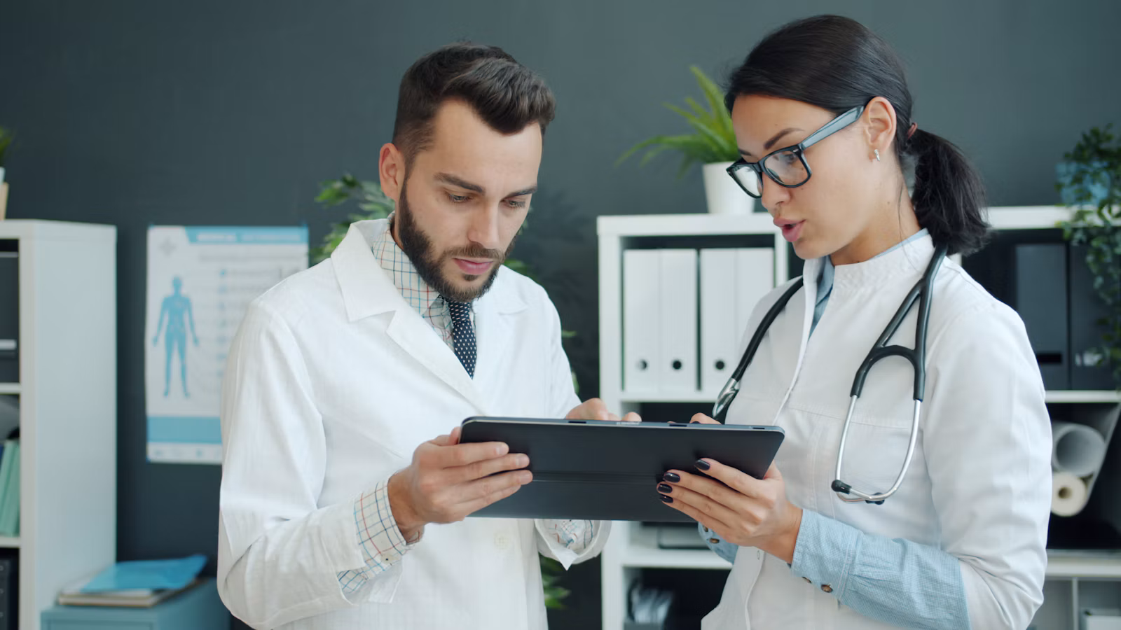 Doctors reviewing AI-supported results, with human oversight