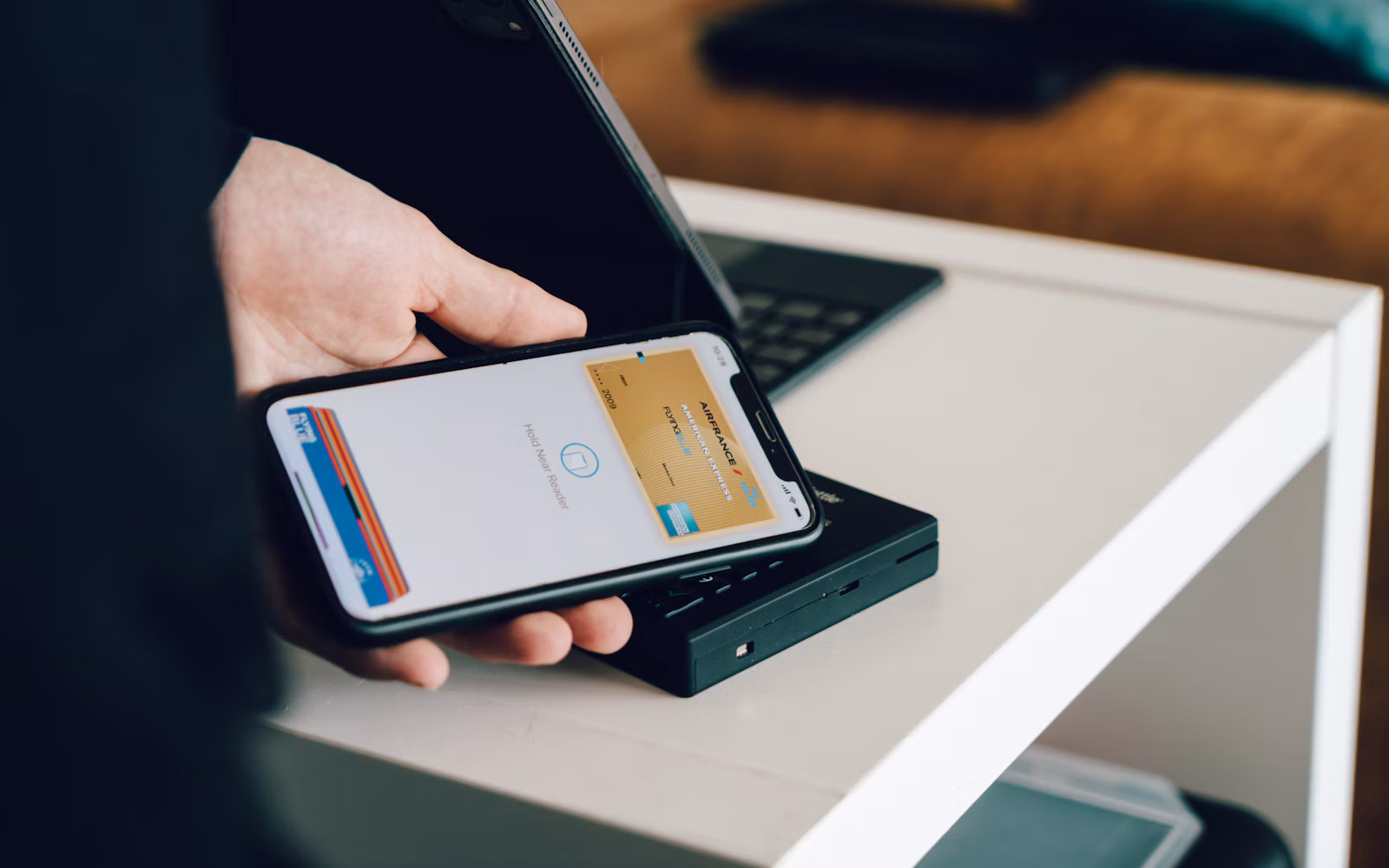 Contactless mobile payment representing app-based authentication in UAE banking