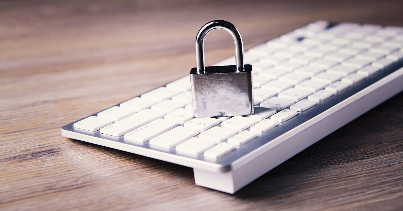 Keyboard with a padlock representing GDPR enforcement and fines